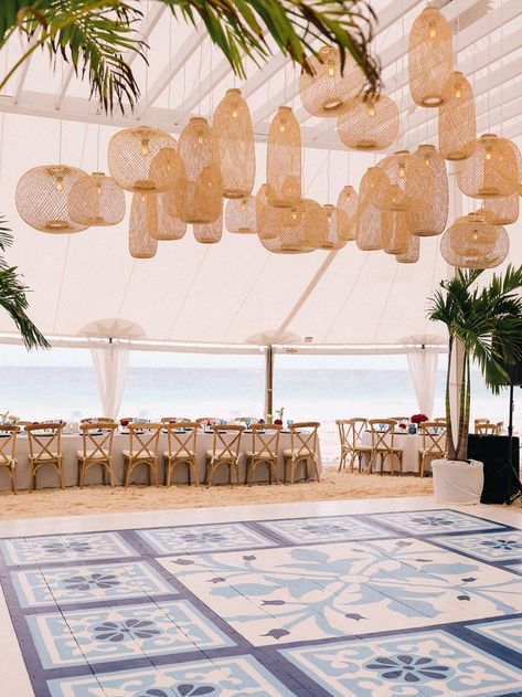 Rattan lanterns and something blue dancefloor reception at The Ocean View Club in Nassau, Bahamas. Destination wedding vision turned reality by Photographer – Lucy Cuneo Photography, Planner – Jacin Fitzgerald Events, and Florist – Jacin Fitzgerald Events. Lanterns Over Dance Floor, Ocean View Wedding Reception, Rattan Lantern Wedding, Ocean Wedding Decorations, Ocean Wedding Reception, Modern Botanical Wedding, Ocean Wedding Decor, Beach Wedding Dance Floor, Rattan Wedding Decor