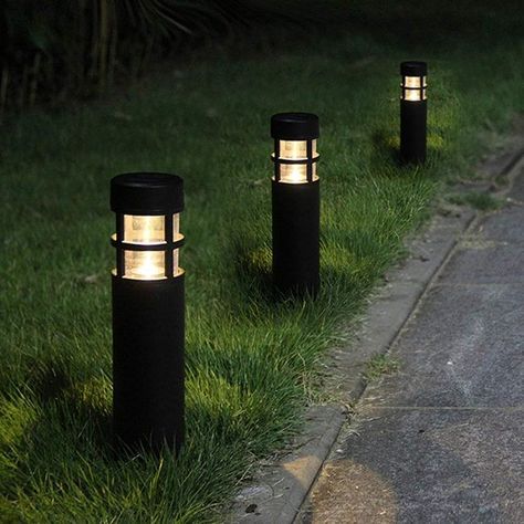 The Best Solar Path Lights for Your Lawn and Garden | BEST MODERN DESIGN: SUNWIND LED Solar-Powered Bollard Path Lighting Path Lighting Ideas, Solar Driveway Lights, Garden Lighting Design, Solar Powered Outdoor Lights, Solar Path Lights, Driveway Lighting, Solar Landscape Lighting, Solar Pathway Lights, Backyard Garden Landscape