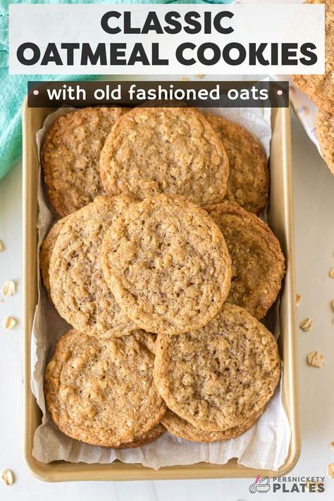 Classic oatmeal cookies with old fashioned oats are simple, no-frills cookies, that are truly the best. If you're like me and prefer to eat your oats in cookie form, then this easy recipe is one you'll love! Basic pantry staples without the need for an electric mixer deliver oats cookies with a chewy texture and buttery, brown sugary flavor with a hint of cinnamon and nutmeg for good measure! | www.persnicketyplates.com Oatmeal Cookies With Margarine, Old Fashioned Rolled Oats Recipe, Recipes With Old Fashioned Oats, Small Batch Oatmeal Cookies, Crunchy Oatmeal Cookies, Cookie Recipe With Oil, Easy Oatmeal Cookies, Homemade Oatmeal Cookies, Old Fashioned Oatmeal Cookies