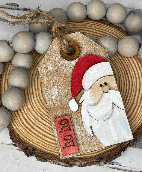 Our Chunky Wooden Christmas Tag/ Ornaments feature several layers. Each is handmade and painted. The base is stained and then whitewashed. These look amazing on a Christmas tree, but also perfect on a gift or even your Christmas Stocking! The DIY version is located in our store. Thank you for supporting our small family business, located in Arizona, USA🌵🇺🇸 All of our tiered tray DIY sets come with: 🌵Wood pieces shown 🌵Basic instruction sheet This is a DIY paint and decorate your own kit. On Christmas Tag Ornaments, Wooden Christmas Tags, Tag Ornaments, Diy Christmas Tags, Idee Cricut, Tiered Tray Diy, Tray Diy, Painted Christmas Ornaments, Wooden Tags