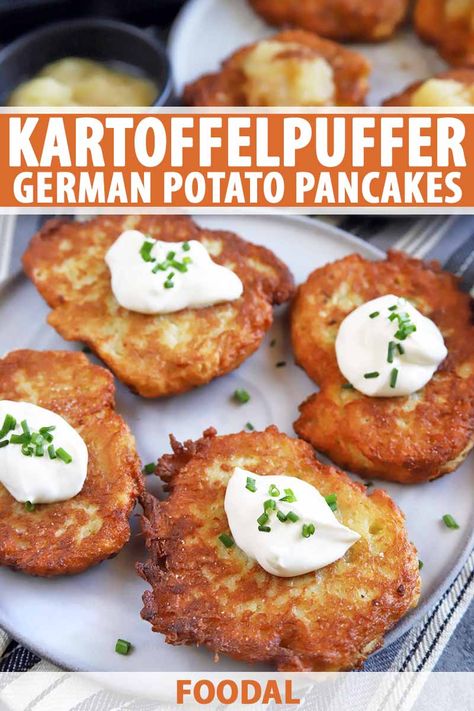 Oktoberfest is the time of year to raise a mug of beer and chow down on kartoffelpuffer, also known as German potato pancakes. Crispy outside and fluffy on the inside, this dish is pure starchy goodness paired with sour cream and chives or applesauce. Read more. #foodal #oktoberfestrecipe #potatopancakes #germanrecipes Authentic German Appetizers, Vegetarian German Recipes, German Vegetarian Recipes, Octoberfest Meals, German Recipes Authentic, Pancakes Crispy, Oktoberfest Recipes, Potato Pancakes Recipe, Easy German Recipes