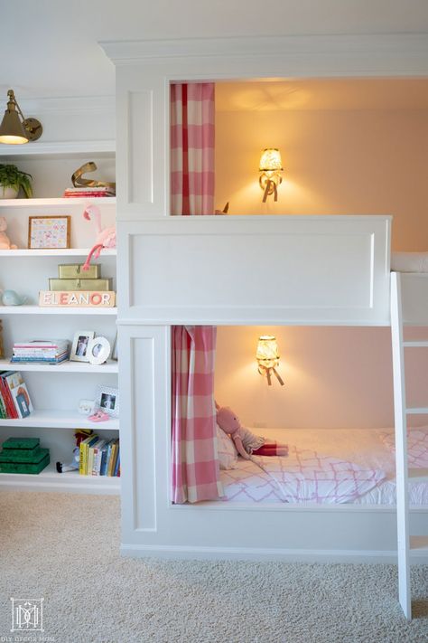 AMAZING DIY built-in bunk beds gorgeous with curtains, elegant design, and lighting make this the ultimate shared girls bunk room! This detailed tutorial shares everything you need to build your own--perfect for a cabin, a beach house, or shared siblings bedroom at home. Built In Bunk Beds With Curtains, Sisters Bedroom Ideas Shared Rooms Bunkbed, Custom Made Bunk Beds, Bunk Beds Lights, Elegant Bunk Beds, Built In Bed With Curtains, Custom Built Bunk Beds, How To Build Bunk Beds, Built In Bunks Small Room