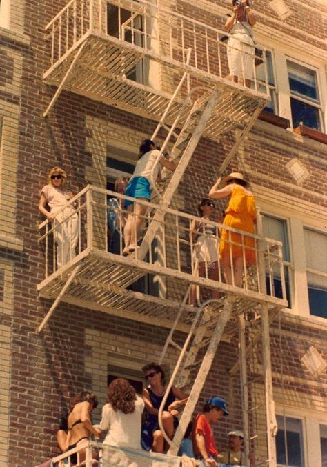 Fire escape party! Fire Escape Photoshoot, Nyc Fire Escape Aesthetic, Fire Escape Aesthetic, New York Fire Escape, Nyc Fire Escape, Friend Dynamics, Fire Escape Stairs, 70s Photography, Stairs Exterior