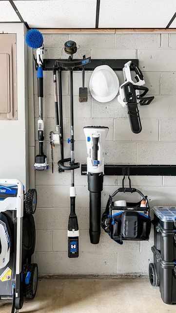 Garage Storage Ideas For Lawn Equipment, Garage Lawn Equipment Storage, Lawn Equipment Storage Ideas, Blower Storage Ideas, Lawn Chair Storage Garage, Lawn Equipment Storage, Charger Ideas, Organizing Tools, Landscaping Equipment