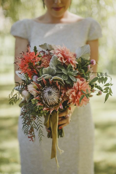 Dahlia and protea bouquet by Mikarla Bauer / Suzanne Harward gown Suzanne Harward, Protea Wedding, Protea Bouquet, Dahlia Bouquet, Red Bouquet Wedding, Tropical Wedding Flowers, Beach Wedding Flowers, Native Flowers, Fall Wedding Bouquets