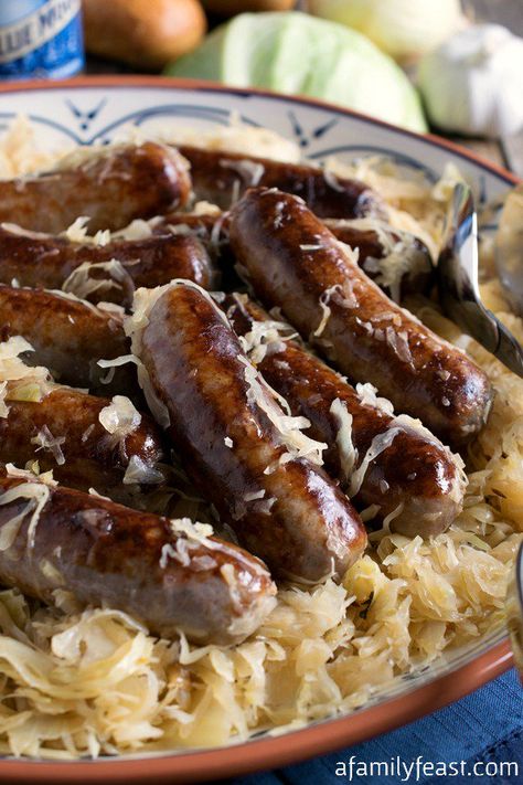 Bratwurst and Sauerkraut - A simple dish with fantastic flavor! We share our tips to ensure a super flavorful meal. Bratwurst And Sauerkraut, Brats And Sauerkraut, Brats Recipes, Bratwurst Recipes, German Food Authentic, Bratwurst Sausage, Smoked Sausage Recipes, Sauerkraut Recipes, Family Feast