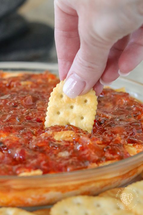 Pepper Jelly Cheese Dip is a warm appetizer served with butter crackers! This easy appetizer recipe uses simple ingredients that have the best flavor when combined. Valentine Party Dips, Hot Jelly Cream Cheese Dip, Hot Pepper Jelly Dip With Bacon, Red Pepper Jelly Dip Appetizer Recipes, Valentines Recipes Appetizers, Hot Pepper Jelly Cream Cheese Dip, Whipped Boursin And Pepper Jelly Dip, Baked Pepper Jelly Cheese Dip, Hot Pepper Jelly Cheese Dip