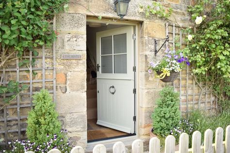 Cottage front door ideas: 10 ways to create a warm welcome | Cottage Patio Doors, Cottage Back Door, Cottage Exterior Doors, Country Cottage Front Doors, Uk Porch Ideas Inside, Cottage Doors Front Entrance, English Cottage Front Door, Cottage Style Front Doors, Farmhouse Lounge