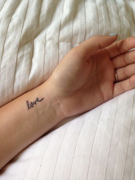 My little wrist tattoo of love in my Mimi's handwriting. Got it with my Mom :) Herz Tattoo Klein, Love Wrist Tattoo, Wrist Tattoos Words, Small Words Tattoo, Wrist Tattoos Girls, Handwriting Tattoos, Small Wave Tattoo, Side Wrist Tattoos, Meaningful Wrist Tattoos