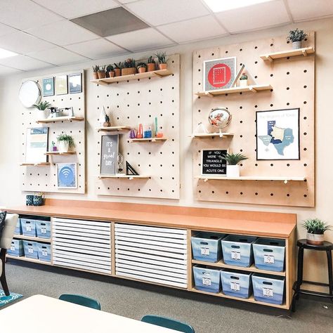 Megan Rowe on Instagram: “These pegboard shelves are one of the most asked about things in my classroom.  My husband built these for me, and they were definitely a…” Classroom Wall Shelves, Peg Board Ideas Classroom, Peg Board Classroom Ideas, Peg Board Classroom, Classroom Pegboard Ideas, Teacher Pegboard, Classroom Shelving Ideas, Pegboard Classroom, Classroom Cabinet Decor