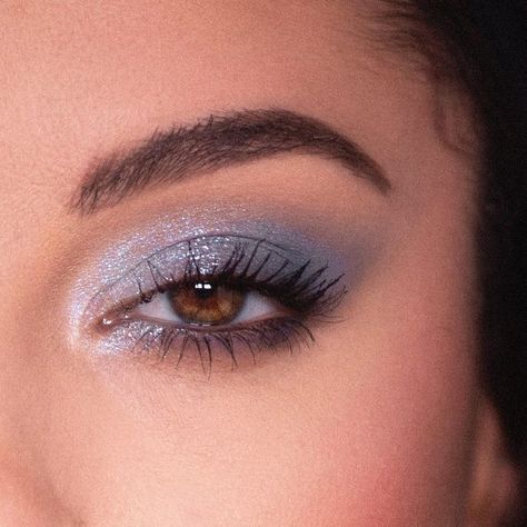 ColourPop Cosmetics on Instagram: "@nessasunshine channeling chill girl energy with our NEW So Elemental palette 🌊✨💿 9 shades of blissful blues and serene, sparkling silvers  NOW AVAILABLE at @UltaBeauty and at colourpop.com! 💙  #denimbluemakeup #bluemakeup #y2kmakeup #2000smakeup #ultabeauty #colourpop" Silvery Blue Eye Makeup, Formal Makeup For Navy Blue Dress, Light Blue Sparkly Eye Makeup, Light Blue And Silver Eye Makeup, Silver Blue Makeup Looks, Quince Makeup Blue Silver, Dusty Blue Eyeshadow, Shimmery Blue Eyeshadow, Periwinkle Makeup Looks For Prom