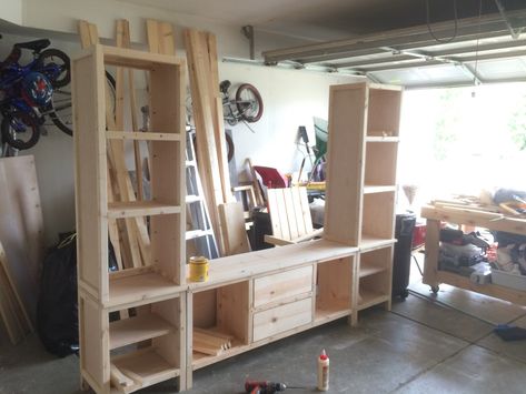 Diy Entertainment Center With Bookshelves, How To Build A Entertainment Center, Bookshelf Entertainment Center Diy, Large Wall Unit Entertainment Center, Farmhouse Entertainment Center Diy, Diy Bookshelf Entertainment Center, 2x4 Entertainment Center, Homemade Entertainment Center, Diy Entertainment Center Plans