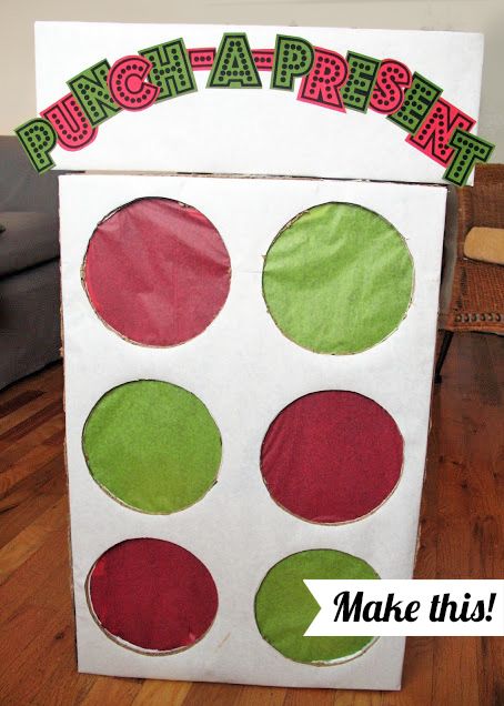 The most fun way to wrap Christmas presents! It's a big cardboard box with smaller sections and to get each gift, you have to punch through the tissue paper. It's like that game on The Price is Right! There's a video tutorial to show you how to make it. Birthday Gifts For Brother, Christmas Games For Kids, Christmas Party Games, A Present, Wrapping Ideas, Gifts For Brother, Christmas Games, Birthday Surprise, Present Gift