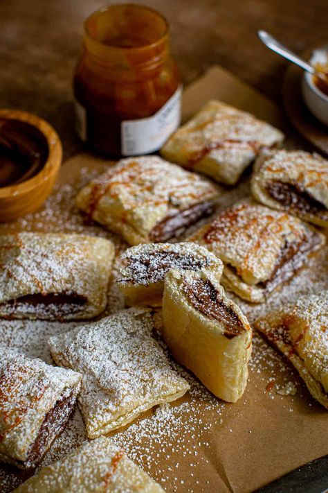 Easy Nutella Puff Pastry Recipe Sailor Bailey Nutella Puff Pastry, Nutella And Phyllo Dough, Nutella Marshmallow Puff Pastry, Nutella Pillsbury Recipes, Easy Nutella Puff Pastry Recipes, Fluffy Pastry Recipe, Nutella Bomboloni Recipe, Phyllo Dough Nutella Recipes, Nutella Pastry Knots