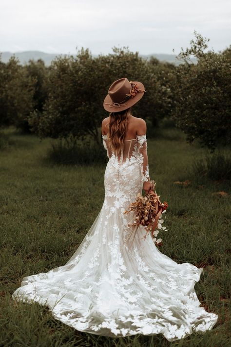 Bohemian Mermaid Wedding Dress, Rish Wedding Dresses, Wedding Dress With A Hat, Wedding Dress Rustic Country, Western Floral Wedding Dress, Rustic Country Wedding Dresses With Sleeves, Mermaid Wedding Dress Western, Casual Mermaid Wedding Dress, Wedding Dresses Ranch Style