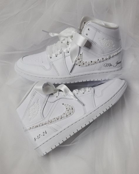 Wedding Sneakers for the Bride. 🕊️💍✨. . . . . . #customshoes #customsneakers #customjordans #rhinestones #artist #sneakerhead #sneakeraddict #sneakergallery #weddinginspiration #bridalshoes #bridetobe #instawedding #bridalsneakers #weddingsneakers #pearls #satin Wedding Sneakers For Bride, Aj1 Mid, High Top Jordans, Bridal Sneakers, Custom Jordans, Wedding Sneakers, Dream Wedding Ideas Dresses, Future Wedding Plans, Sneakers Addict