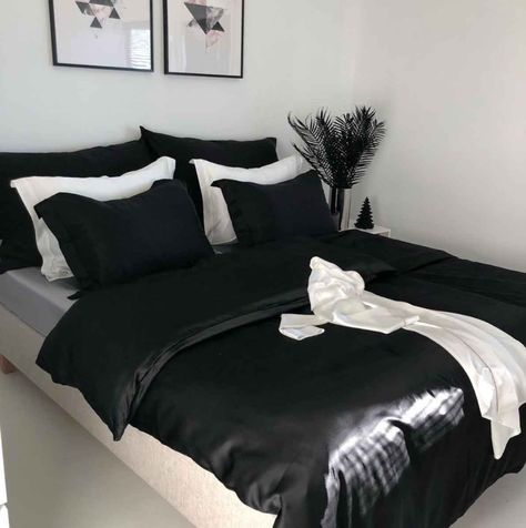 Best Black Silk Sheets for a Wonderfully Chic Night of Sleep. - The Mood Guide All Black Bedding Ideas, White Bedframe Black Bedding, White Bed With Black Sheets, White Sheets Black Comforter, Black Bedding White Room, Black Silk Sheets Bedroom, Black Silk Comforter, Black Bedsheets Bedroom Aesthetic, White Bed Black Bedding