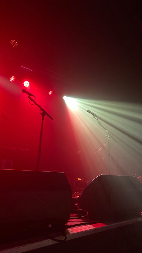 Spotlight on red flooded stage with two empty microphones ready for a perfromance. Stage aesthetic, concert :) Stage With Microphone, Concert From Stage, Stage Background Aesthetic, Concert Lights Aesthetic, Concert Stage Aesthetic, Small Venue Concert, Red Concert Aesthetic, Stage Aesthetic Concert, Spotlight Aesthetic