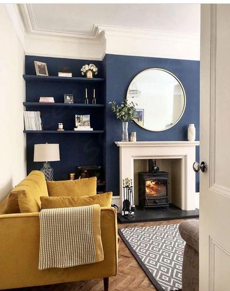 Living room with navy blue walls and white trim, ochre yellow sofa, mustard yellow decor, blue interiors Cool Living Room Ideas, Blue And Mustard Living Room, Mustard Living Rooms, Vintage Living Room Design, Cool Living Room, Living Room Ideas With Fireplace, Fun Living Room, Dark Blue Living Room, Navy Living Rooms