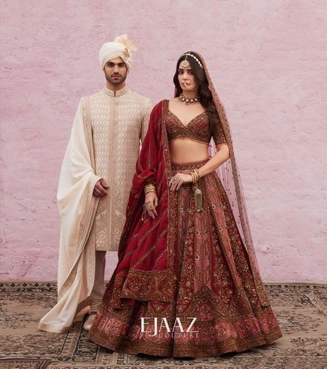 Ejaaz Couture on Instagram: "Breathing in a ton of cultural hues and ethnicities, our bride and groom are ready to invite you to their world where the most beautiful moments are found. Homage to heritage, Crafted for the new age and Curated with love ~ Our bridal couture treasure ~ Humsafar Collection available at the Flagship Store. — Shop with us: ⚜️at our Flagship Store : D 33, First Floor, Defence Colony, New Delhi - 110024 ⚜️Whatsapp : +91-9873789288 ⚜️Website : Link in the bio ⚜ Bride And Groom Indian Wedding Outfit, Payal Keyal, Maroon Bridal Lehenga, Latest Bridal Lehenga Designs, Winter Wedding Outfits, Bridal Lehenga Designs, Latest Bridal Lehenga, Desi Wedding Dresses, Wedding Lehenga Designs