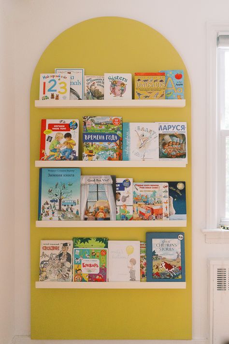 Half Wall Playroom, Book Display On Wall, Book Shelves Ikea, Ikea Book Display, Painted Arch Shelves, Wall Book Display, Kids Book Storage Wall, Playroom Book Storage, Toy Display Shelves