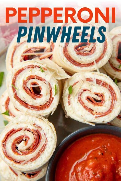 Pepperoni pinwheels are easy to make and fun to eat—a hit for parties or school lunches. 4th Of July Pinwheels, Lunch Appetizers Easy, Party Pinwheels Recipe, Pepperoni Pinwheel Appetizers, Cold Appetizer Recipes Easy, Pin Wheel Sandwiches Recipes, Pepperoni Wraps, Pin Wheel Recipes Easy, Appetizers For Camping