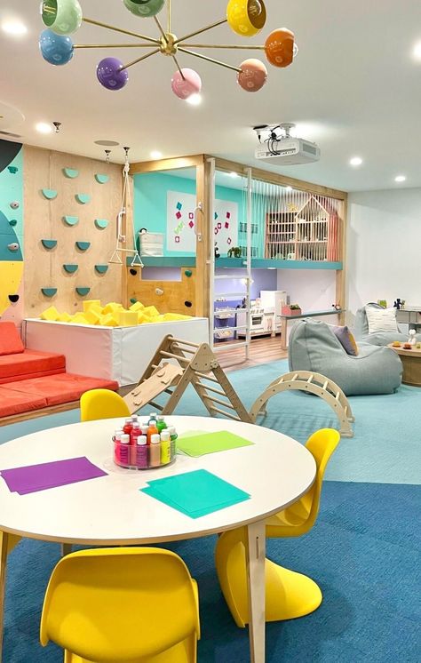 Two Story Playroom, Playground Design Indoor, Bold Playroom, Playroom Ideas Colorful, Educational Playroom Ideas, Kids Playground Ideas, Luxury Daycare, Indoor Playground Diy, Colorful Playroom Ideas