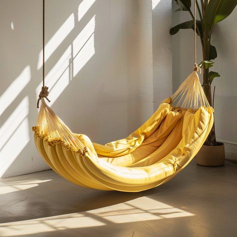 Introducing the “Banana Bliss Hammock” – a vibrant yellow haven for ultimate relaxation. Inspired by the curved shape of bananas, it cradles your body for unmatched comfort. Hang it up, and swing into tropical bliss! Conceptual AI Art Follow @ecosapiens for more! Unique Products Design, Outdoor Swing, Porch Swing, Bananas, Hammock, Outdoor Space, Relaxation, Perfect Gift, Yellow