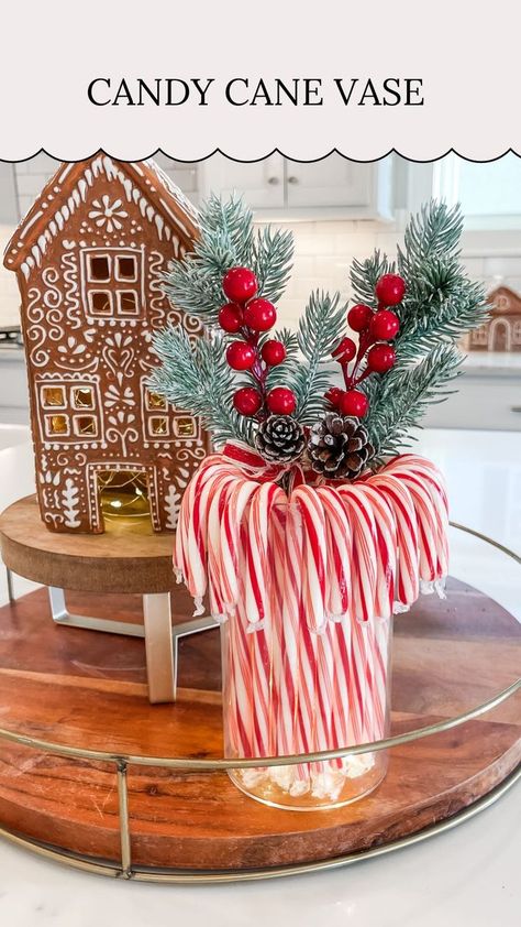 🎄Candy Cane Vase 🎄⁣⁣⁣ ⁣⁣⁣ Save this for a super easy + budget friendly Christmas DIY! Here’s a little sneak peak of the Christmas fun I have planned for the upcoming season!⁣ ⁣ I added fairy lights to a small vase, looped candy canes over it & added some Christmas stems! Such an easy Christmas craft that would make a beautiful centerpiece!⁣⁣⁣ .⁣⁣⁣ .⁣⁣⁣ .⁣⁣⁣ .⁣⁣⁣ #christmas #christmasdiy #christmascraft #christmasdecor #christmasdecorations #christmasdecorating #christmasinspiration #christmasdec Candy Cane Jar Decor, Candycane Christmas Table Decor, Diy Gingerbread Centerpiece, Christmas Candy Centerpieces For Table, Peppermint Centerpieces Diy, Candy Cane Christmas Table Decorations, Candy Cane Decorations Diy Dollar Stores, Cute Christmas Centerpieces, Christmas Candy Cane Theme