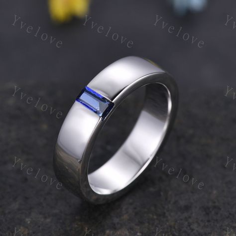 Mens Blue Sapphire Wedding Band Baguette Cut Sapphire Band 5mm Solid Gold Ring Mens Solitaire Stacking Matching Band Retro Vintage Ring Gift Anniversary Ring Gift for mens ITEM SPECIFICATIONS:  Material:925 sterling silver ,rose gold plated,yellow gold plated,white gold plated Solid gold (10k 14k 18k rose gold,yellow gold,white gold available) Platinum are all available Main stone: 5x2.5mm baguette cut lab created sapphire band width:5mm Size and color can be choice.Handmade fine jewelry. Our Service: All sizes available,please feel free to contact me if you need another ring sizes. Craft Period:Because all of rings are handmade to orders,it takes about 13-15 business days to make (not include weekend) and 3-5 business days for arrival,thanks for your understanding. Rush Order:We offer rus Blue Sapphire Rings Men, Platinum Rings For Men, Mens Sapphire Wedding Band, Wedding Band Baguette, Mens Sapphire Ring, Blue Sapphire Wedding Band, Baguette Wedding Band, Mens Diamond Wedding Bands, Sapphire Wedding Band