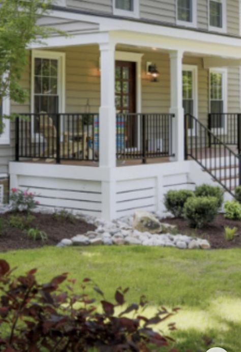 Shiplap Deck Skirting, House With Covered Front Porch, Replace Lattice Under Porch, Front Door Off Center Porch, Farmhouse Porch Skirting, Skirting For Pier And Beam Homes, Deck On White House, Front Porch Railings Farmhouse, Alternatives To Lattice Under Porch