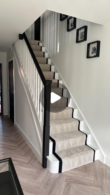 Black Interior Stairs, Black And Neutral Staircase, White And Black Bannister, Black And White Bannister Rail, Grey Staircase Ideas, Black Banister Hallway Ideas, Beige And Black Stairs, Black Bannister Grey Carpet, Black Coving