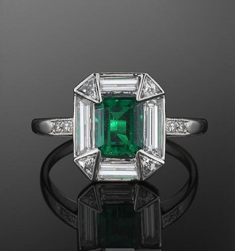 Platinum Emerald and Diamond Ring, c. 1920s.  A square emerald weighing approximately 0.75 carats is set in a halo of baguette and triangular diamonds in a platinum mounting. Flawless Diamond Ring, Origami Insects, Bracelets Rainbow, Fashion 1920s, Bijoux Art Deco, Art Deco Emerald, Loom Charms, Fred Leighton, Bows Ribbon