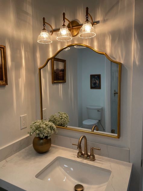 Guest Bathroom inspo Half Bath With Gold Fixtures, Vanity Table Lighting, Bathroom Remodel One Sink, Half Bathroom Ideas Vintage, Vintage Inspired Small Bathroom, Gold Accented Bathroom, Guest Bathroom With Window, No Demo Bathroom Update, Bathroom Gold Faucet