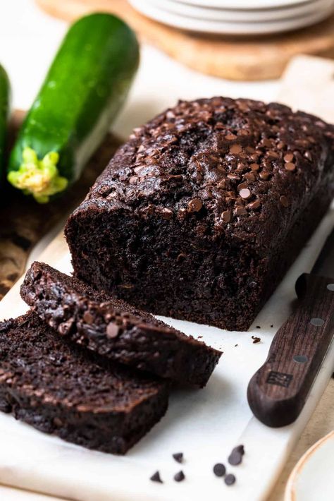 When monster chocolate cravings strike, feed it a slice (or two!) of Double Dark Chocolate Zucchini Bread! Moist, fudgy, and chock full of chocolate chips! chocolate zucchini bread // double chocolate zucchini bread // chocolate zucchini bread recipe #easy #moist #recipe #zucchini #kitchenconfidante Double Chocolate Chip Zucchini Bread, Zucchini Loaf Recipes Chocolate Chips, Zuchinis Bread Recipe Chocolate Chip, Chocolate Zucchini Bread Muffins, Chocolate Chocolate Chip Zucchini Bread, Easy Chocolate Zucchini Bread, Choc Zucchini Bread, Easy Zucchini Recipes Desserts, Chocolate Zucchini Bread Recipes