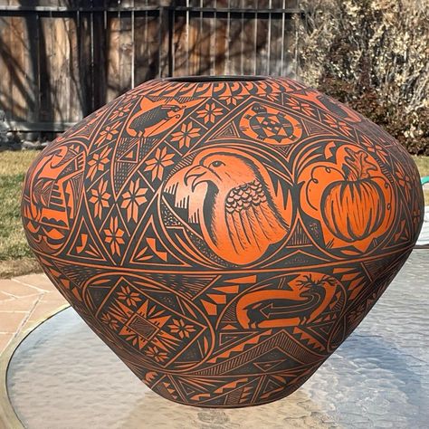 Large Acoma, New Mexico terra cotta Native Indian pot, "T.M. Chino", decorated with birds, height is 15", in good condition, no cracks, chips. Pottery Vase depicting animals; fish, hummingbirds, elk, turtles and more. Terrance M. Chino, Sr. is a full blooded Native American. He is a member of the Sun Clan and he was born in 1965 into the Acoma Pueblo. He learned the ancient traditional methods of working with clay art from his mother, the late, Evelyn L. Chino. She taught him all the fundamentals of where to gather clay and how to prepare and hand coil pottery. She also taught him the importance of continuing the long lived tradition of his ancestors. Signed T.M. Chino Acoma, N.M. on bottom. Native American Pottery Designs, Native American Pots, Historic Pottery, Historical Pottery, Acoma Pottery, Historic Ceramics, Side Hussle, Terra Cotta Pottery, Acoma Pueblo