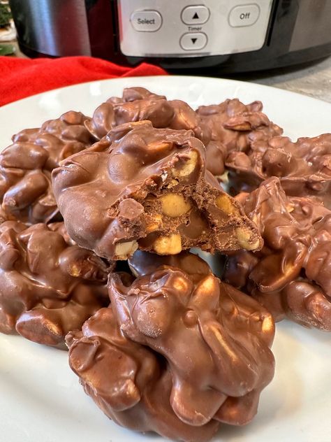 Crock Pot Peanut Clusters Chocolate Covered Nuts Clusters Crock Pot Candy, Crock Pot Peanut Clusters, Nut Cluster Recipe, Peanut Clusters In Crockpot, Crockpot Candy Recipes, Chocolate Nuts Clusters, Chocolate Peanut Clusters, Holiday Candy Recipes, Chocolate Covered Nuts