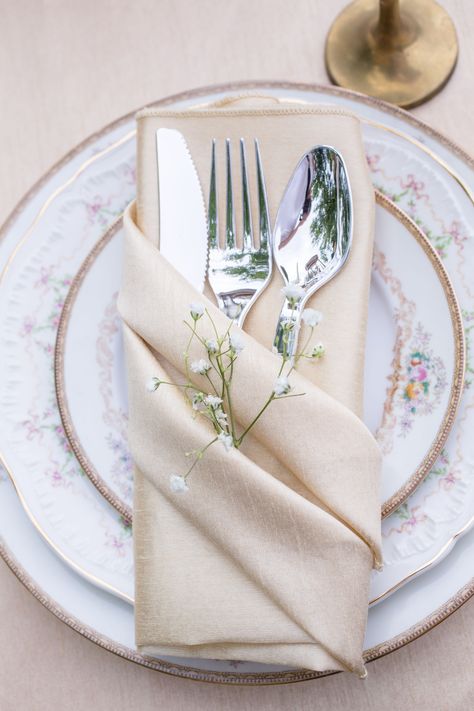 Champagne Linens and Vintage Floral China Napkin Folding For Wedding Receptions, Flower In Napkin Table Settings, Table Napkin Design Ideas, Wedding Serviettes Ideas, Napkin Folds For Wedding, Vintage Napkins Wedding, Elegant Napkin Folds, Napkin On Plate, Napkin Folding Ideas Wedding