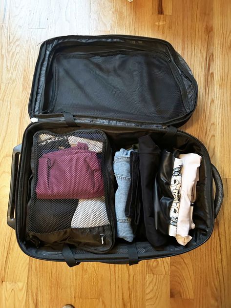 Suitcase on floor packed with rolled clothes and mesh bag Suitcase Packing Tips, Tire Pictures, Shopping Pictures, Packing Bags Travel, Apple Gift Card, Small Suitcase, Packing Clothes, Konmari Method, Mom Pictures