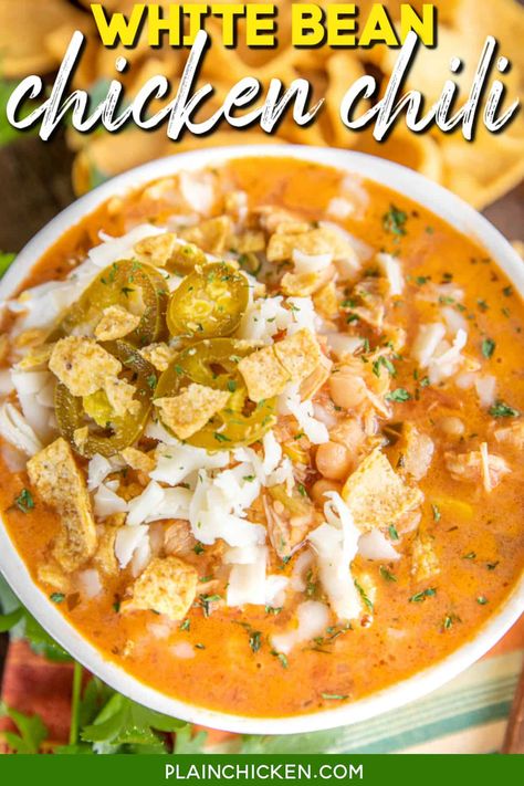 Slow Cooker White Bean Chicken Chili - SO easy and delicious! Just dump everything in the slow cooker and let it do its thing. Chicken, white beans, diced green chiles, chicken broth, salsa, cumin, and grated cheese. It smells amazing while it is cooking and tastes even better! Top the chili with sour cream, Fritos, extra cheese, and jalapeños. Serve with some quick homemade cornbread. Comfort food at its best! Gluten-free Slow Cooker White Bean Chicken Chili, White Bean Chicken Chili Slow Cooker, White Chicken Chilli, Plain Chicken Recipe, Slow Cooker Breakfast Casserole, White Bean Chicken Chili, Slow Cooker Chicken Chili, White Bean Chili, White Chili Chicken Recipe