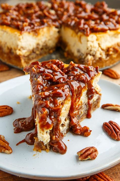 Pecan Pie Cheesecake with Pecan Caramel Sauce Carmel Pecan Cheesecake, Caramel Pecan Cheesecake Pie, Pecan Praline Cheesecake, Pecan Caramel Sauce, Caramel Pecan Topping, Pecan Cheesecake Recipes, Basic Cheesecake Recipe, Pumpkin Pecan Cheesecake, Praline Cheesecake