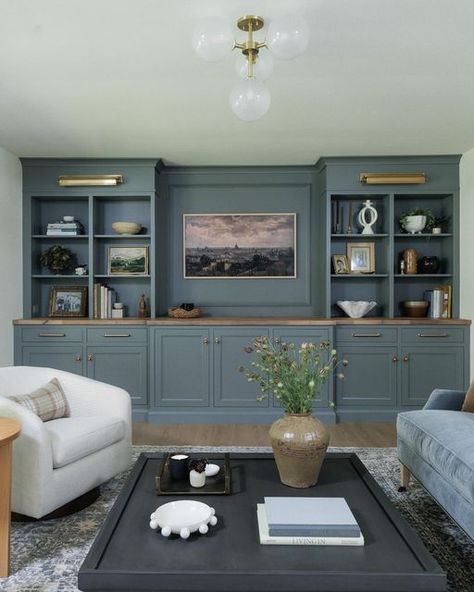 Jean Stoffer on Instagram: "The Living Room at our brick ranch project got a major upgrade with this wall of cabinetry from our Townhouse Collection @stofferhomecabinetry in elegant Camden Grey. Check this line out if you have a more moderate budget. Same excellent quality and design, just limited choices, bells and whistles. And if you want to see the whole project check out Episode 4 of The Established Home! Streaming on Max and Discovery+. ❤️" Living Room Built In Cabinets, Painted Built Ins, Stoffer Home, Jean Stoffer, Family Lounge, Built In Entertainment Center, Built In Shelves Living Room, Living Room Built Ins, Built In Cabinet