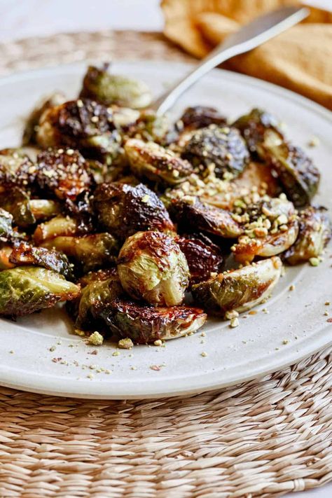 These Orange Miso Glazed Brussels Sprouts are a quick and easy side dish, roasted to perfection and coated in a delicious sweet and savory glaze. Perfect for the holidays or any night of the week, this gluten-free and dairy-free dish might just become your new favorite way to enjoy Brussels sprouts! Lemon Miso Brussel Sprouts, Miso Brussel Sprouts, Glazed Brussels Sprouts, 30 Minute Meals Easy, Miso Glaze, Thanksgiving Dinner Recipes, Vegan Side Dishes, Side Dish Recipes Easy, Easy Side Dish