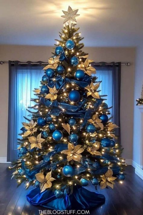 60 Christmas Tree Decor Ideas to Inspired You Men Christmas Tree Ideas, Notre Dame Christmas Tree, Christmas Tree Decorations Blue And Gold, Christmas Tree Themed Ideas, Christmas Trees With Flowers, Christmas Tree Ideas Blue And Gold, Blue And Gold Christmas Tree Ideas, How To Add Ribbon To Christmas Tree, Blue And Yellow Christmas Tree