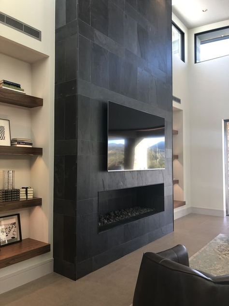 TV Above Fireplace: Should You Avoid It...or Do It? Basement Tv Wall Ideas Fire Places, 3 Sided Fireplace Mantel, Large Living Room With 2 Sofas, Fireplace And Media Wall, 2023 Kitchen Hood Trends, Black Tv Fireplace Wall, Paneled Study Walls, Large Bare Wall Ideas, Tiled Modern Fireplace