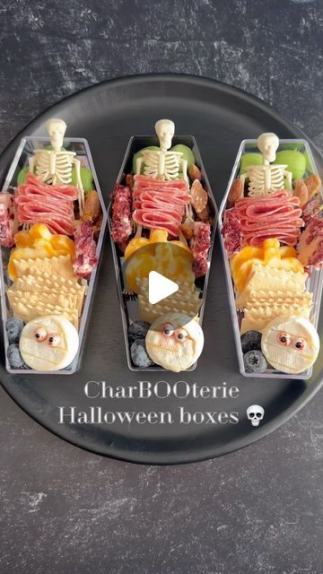 Melissa on Instagram: "CharBOOterie Halloween boxes 💀

Welcome to episode 32 of @melissas_healthykitchen spooky eats series. Today we are turning my charBOOterie board into the cutest grab and go charBOOterie Halloween boxes.

Save for later and follow along for more spooky eats!

What you’ll need:
1. Coffin boxes
2. Mini skeletons
3. Salami
4. Kiwi berries
5. Nuts of choice, I used maple spiced nut mix
6. Cheese of choice, I used mini brie bites with candy eyes on them, Colby Jack cut out into pumpkins, cranberry chèvre goat cheese)
7. Blueberries
8. Crackers of choice, I used organic sourdough flatbread bites
.
.
#spookyeats #spookyfood #halloweenfood #halloweenpartyfood #halloweenpartyideas #charcuteriebox #charcuterieboxes #charbooterie #cheeseandmeat #charcuterietogo #festivefood #ha Mini Halloween Charcuterie Board, Coffin Charcuterie, Mini Brie Bites, Charbooterie Board, Sourdough Flatbread, Traditional Refried Beans, Halloween Boxes, Vegan Shredded Cheese, Kiwi Berries