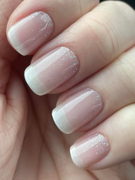 Our In the-Mood-for-Love semi cured gel nail stickers features a beautiful ombre effect with a mix of delicate pink and white hues. This signature style is our best-seller and suitable for everyone, adding a touch of timeless elegance to any occasion.Whether you're heading out for a romantic dinner, a night out with friends, or simply want to add a touch of glamour to your everyday look, or don't know where to start, our In the Mood for Love nail stickers is the perfect choice. Glitter Tip French Manicure, Oval Nails Designs Ombre, Glitter Bottom Nails, White Sparkle French Tip Nails, Sheer Glitter Nails, Ombre Sparkle Nails, Pink Ombre Nails Glitter, Sparkle French Manicure, Ombre French Tip