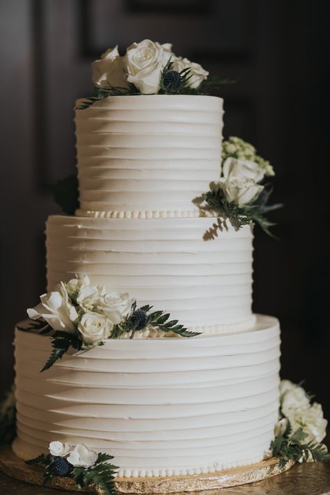 Three Tier Round White Wedding Cake on Flat Gold Cake Stand with White Rose and Greenery and Ferns Ferns Wedding, Vintage Pasta, Gold Cake Stand, 3 Tier Wedding Cakes, Dream Wedding Cake, Floral Wedding Cakes, Romantic Wedding Cake, Rings Ideas, White Wedding Cakes