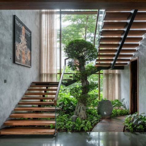 Modern Tropical Stairs, Internal Courtyard With Stairs, Indoor Garden Stairs, Courtyard Staircase Design, Staircase In Courtyard, Stairs Modern Design, Tropical Stairs, Staircase With Plants, Modern Tropical House Interior