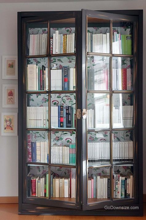 Scaling things up is this tall, wooden antique bookcase with a print that has an enchanting pattern on it to line the insides. Glass Cabinet Bookcase, Book Rack Design With Glass Door, Library Glass Doors, Library With Glass Doors, Bookshelves Glass Doors, Bookshelves With Glass Doors, Bookshelves Ideas For Bedroom, Bookshelves With Doors, Book Shelf With Doors